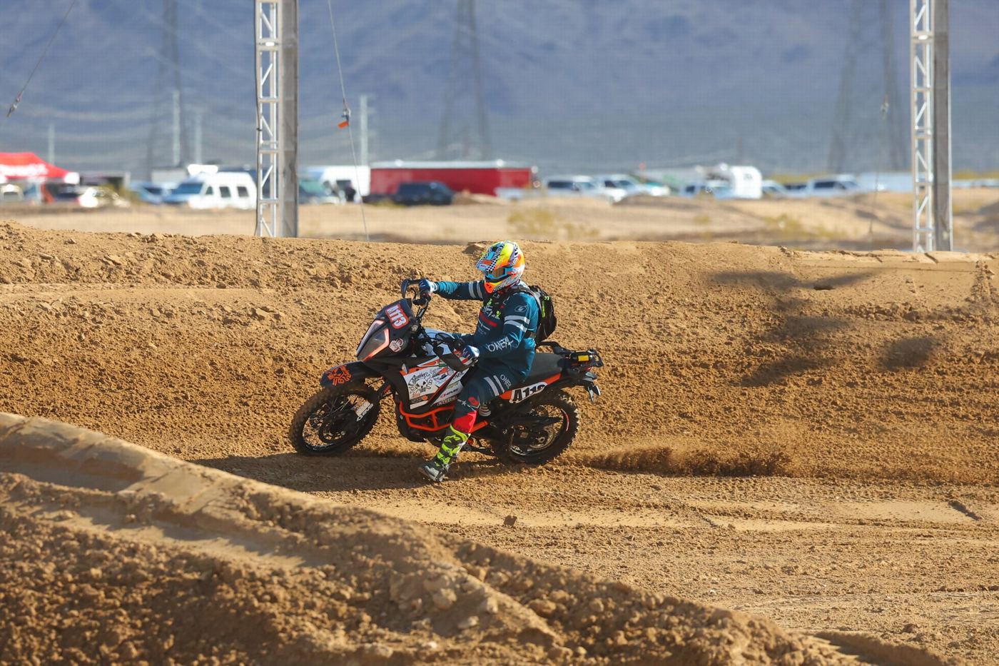 Roosting dirt off a berm in the infield