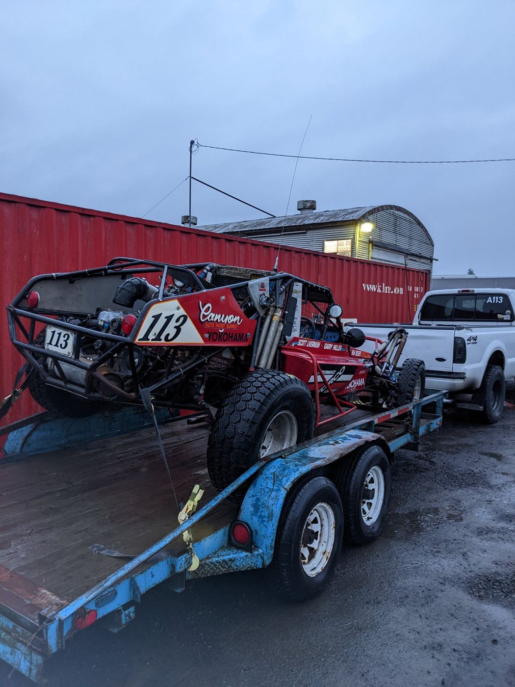 Desert race car 113 on a trailer, waiting for restoration