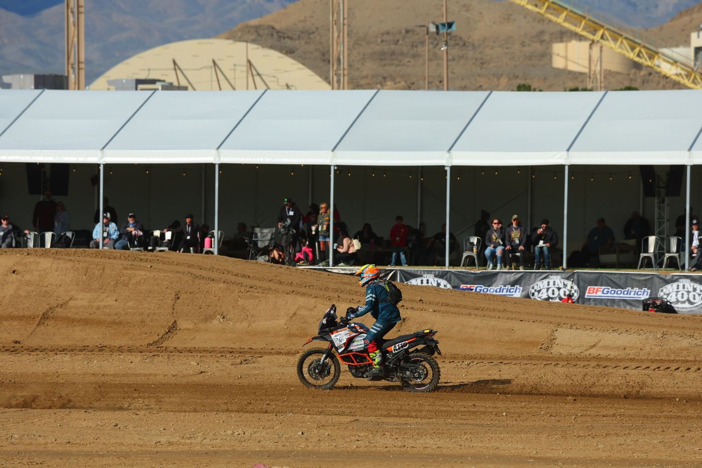 Riding past the hospitality tent